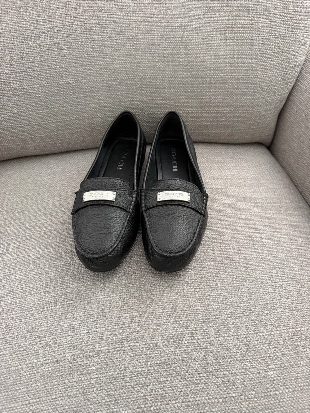 Coach Black Pebbled Leather Slip-On Loafers with Silver Plaque